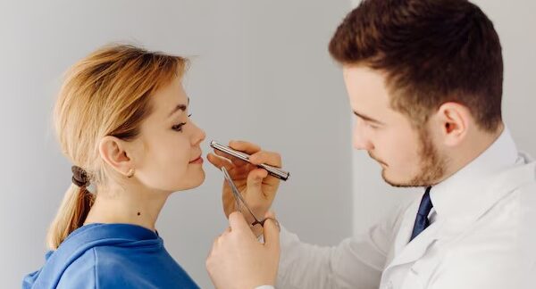 doctor checking patients nose in a ENT hospital in London